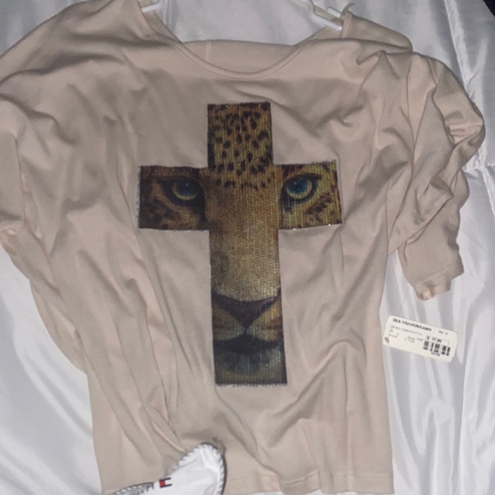 Animal print face with cross, sequins top.